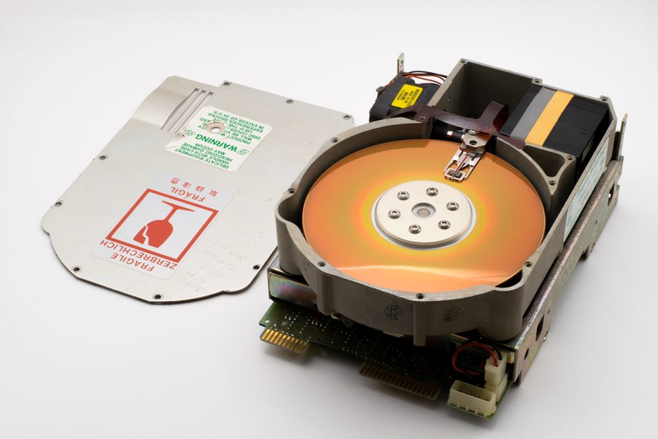 hard drive covered in handwritten labels in Japanese and English