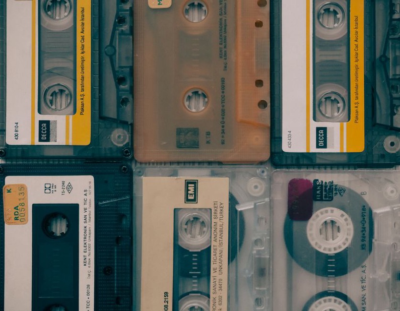 Hand-labeled cassette tape in a noise collection