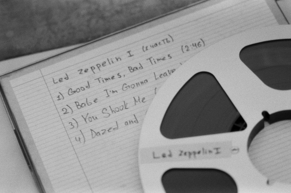 A C30 cassette with five track titles listed on the J-card, each lasting around three minutes