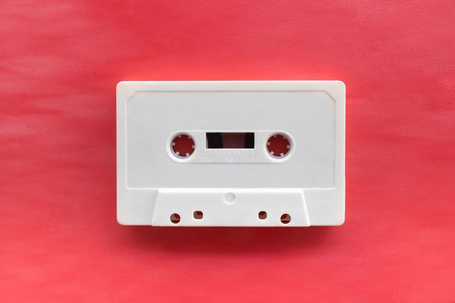 Cassette shell with "3 2" marked by hand on a white sticker