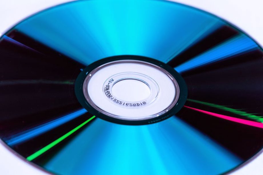 Handwritten inscription on a silver CD-R surface showing the filename