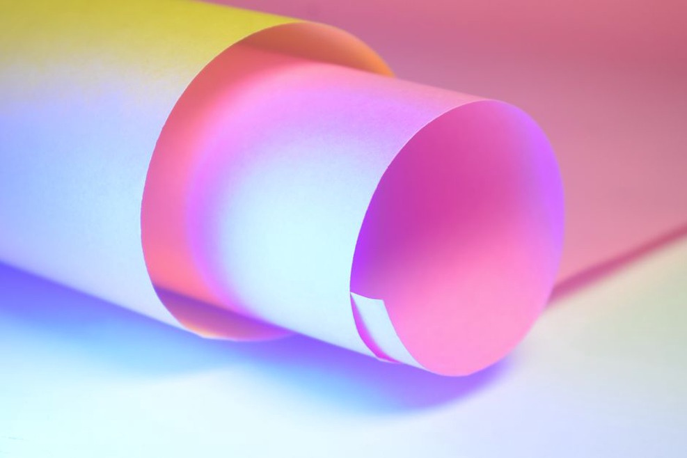 close-up of offset cyan and magenta layers on a cassette insert