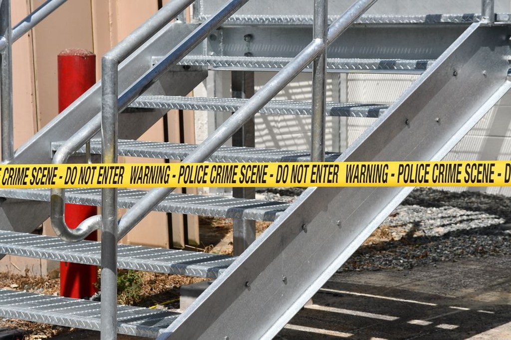 contact mic attached to a steel railing with blue tape