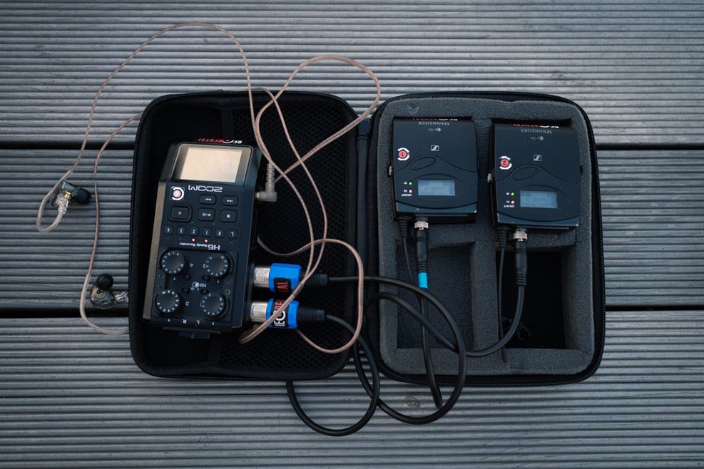 portable recorder with small microphones positioned over flowing water