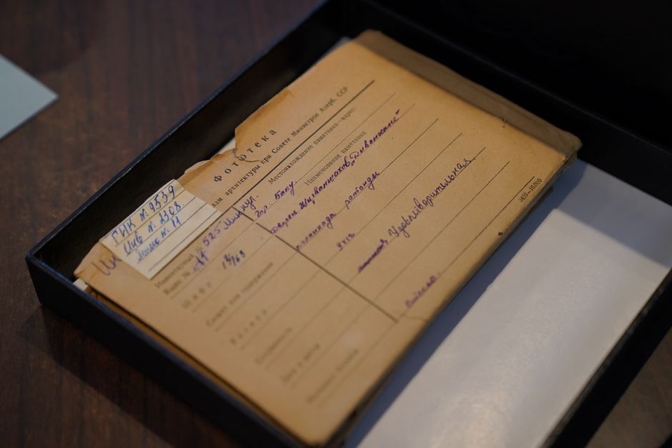 cassette with worn paper label and smudged ink
