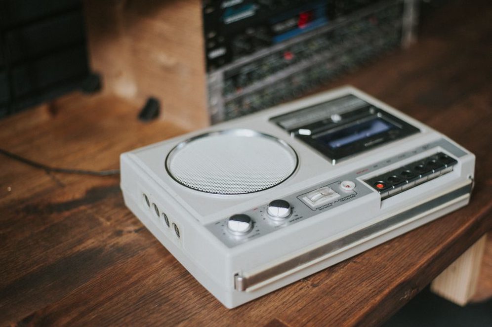 a Tascam 4-track recorder with a dusty surface