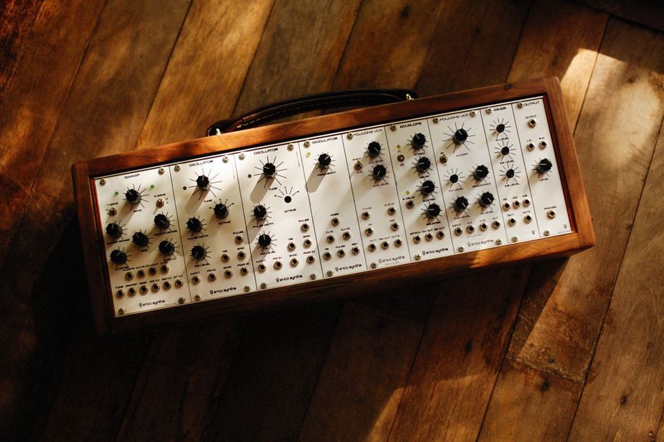 Vintage synthesizer with knobs and cables