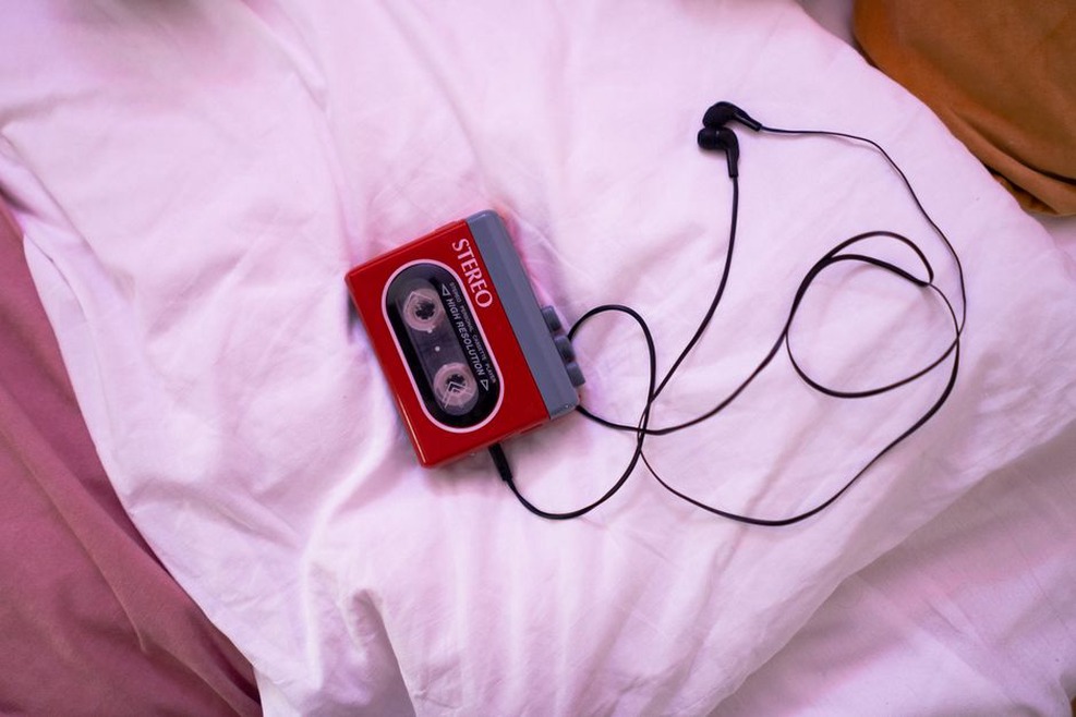 A cassette deck and headphones prepared for close listening