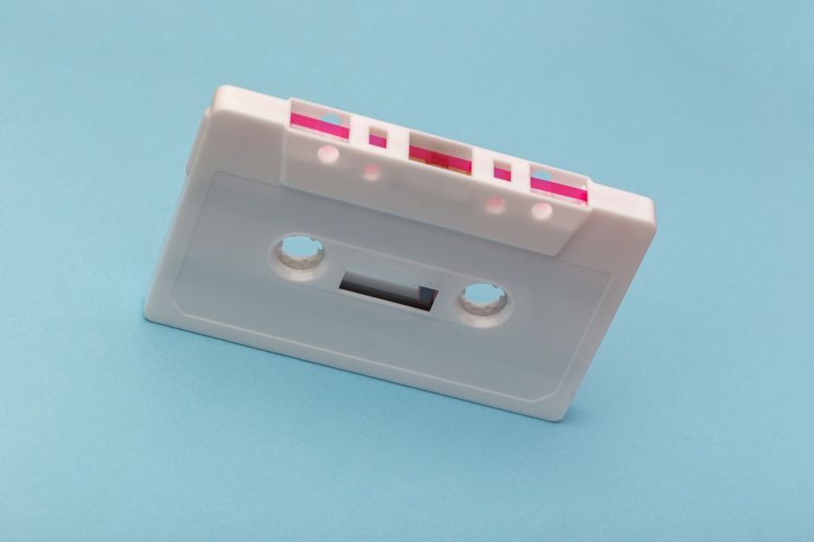 Blank cassettes beside sleeves awaiting assembly
