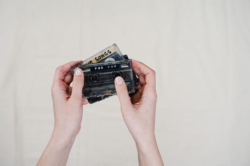 Paper covers and tapes arranged across a worktable