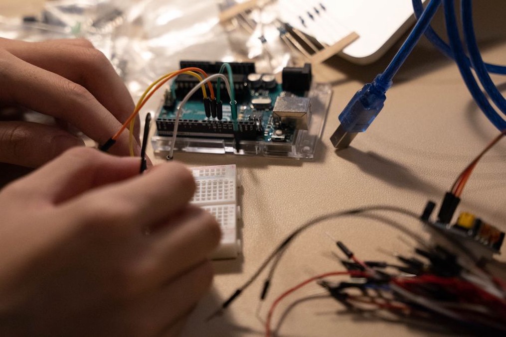 Hand-built circuit and patch leads on a workbench