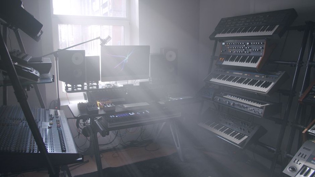 A compact studio arranged for slow attentive listening