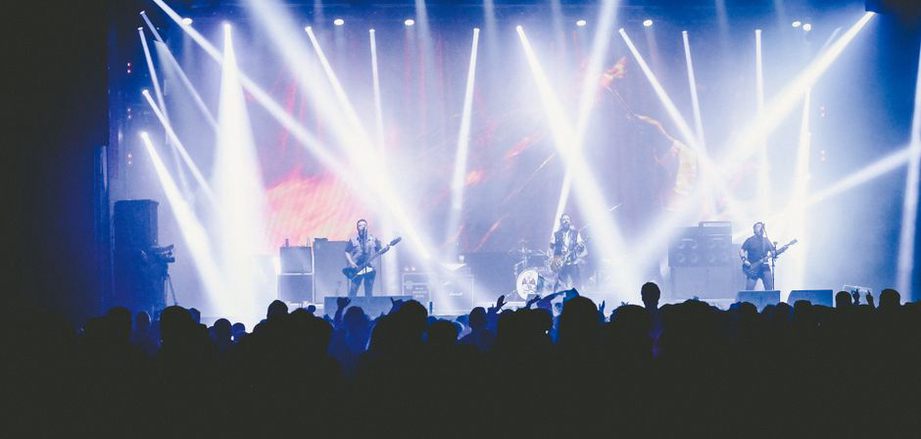 A live performance with intense visual projections and lighting