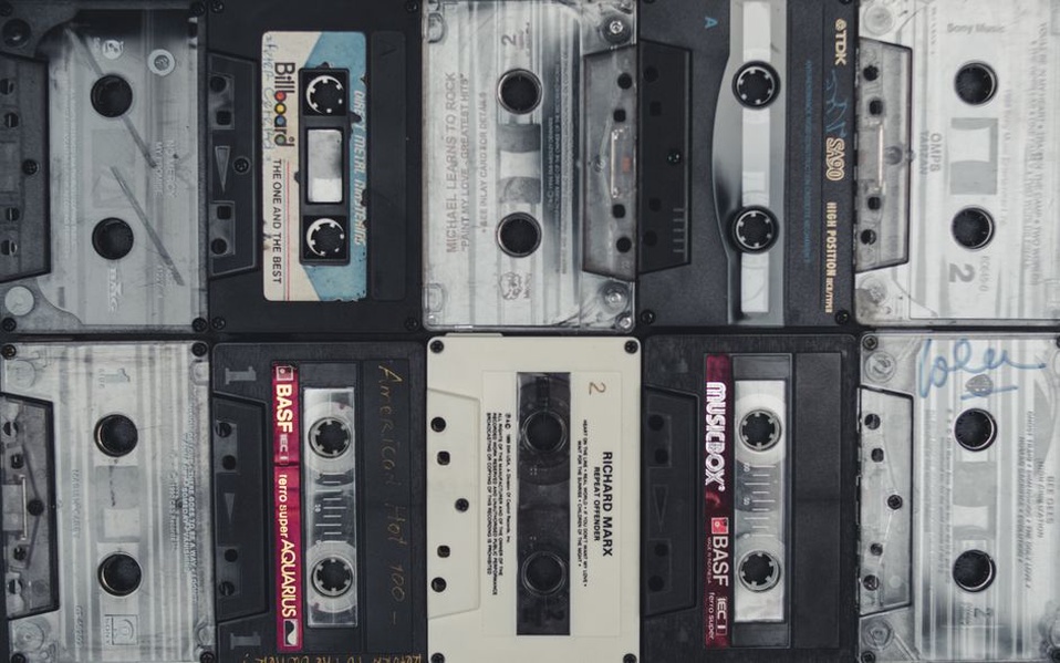 A collection of Japanese noise music cassettes showcasing DIY artwork
