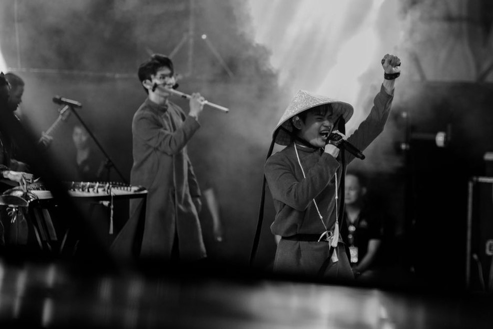 A close microphone beside a bamboo flute