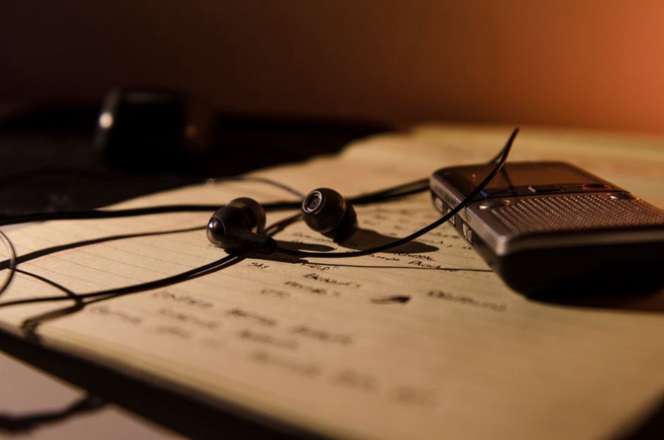 Recorder and headphones ready for close listening