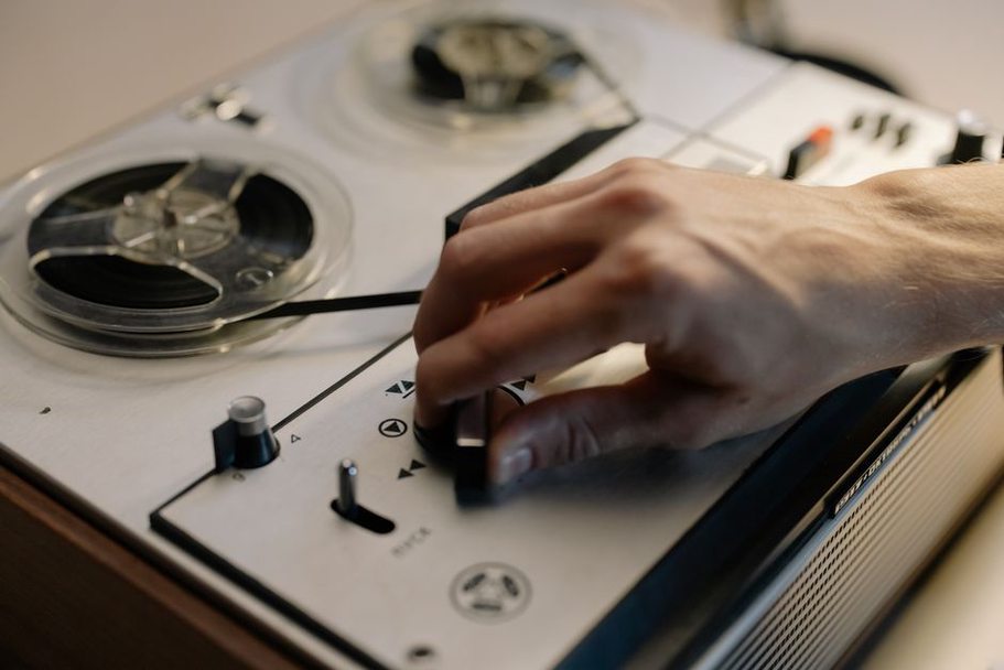 Tape reels beside an editing deck