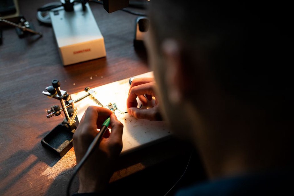 Careful soldering on a compact audio circuit