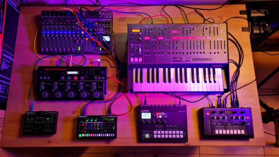 Electronic instruments and tape equipment on a worktable