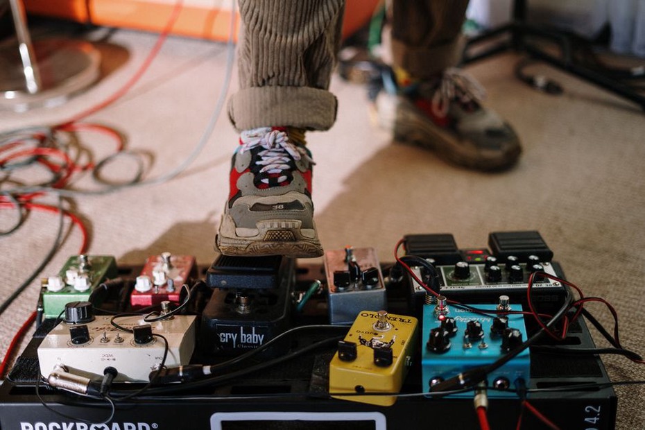 Cables and controls within reach of a performer