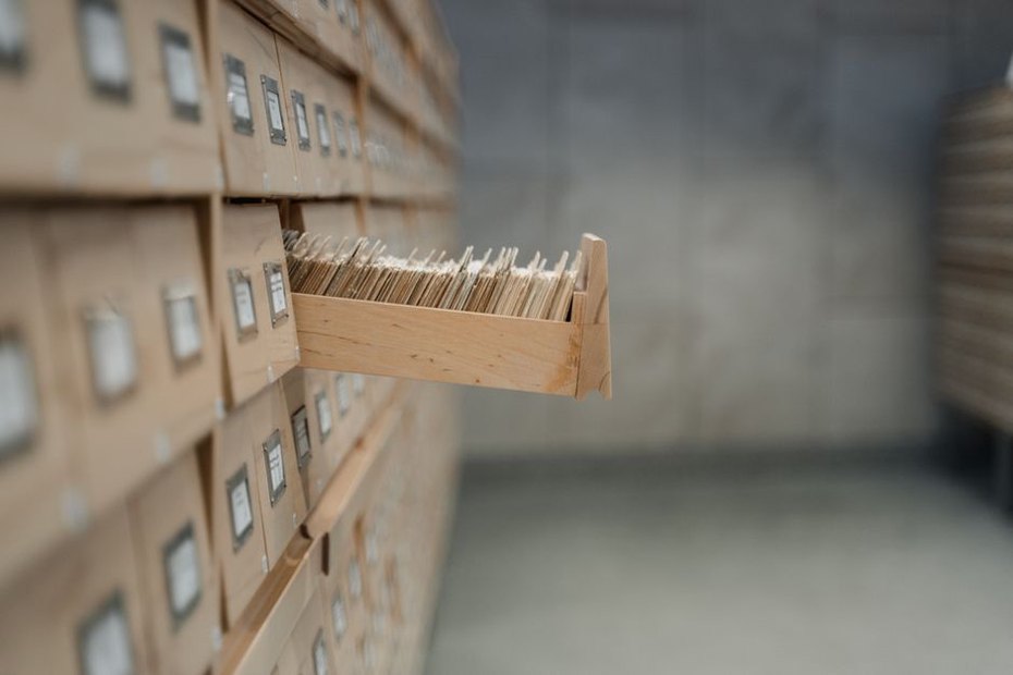 Index cards arranged beside a music journal