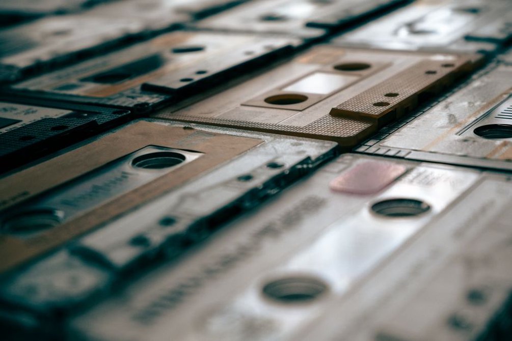 Cassette artwork beside a handwritten release note
