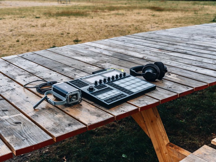 A recorder listening toward the street below