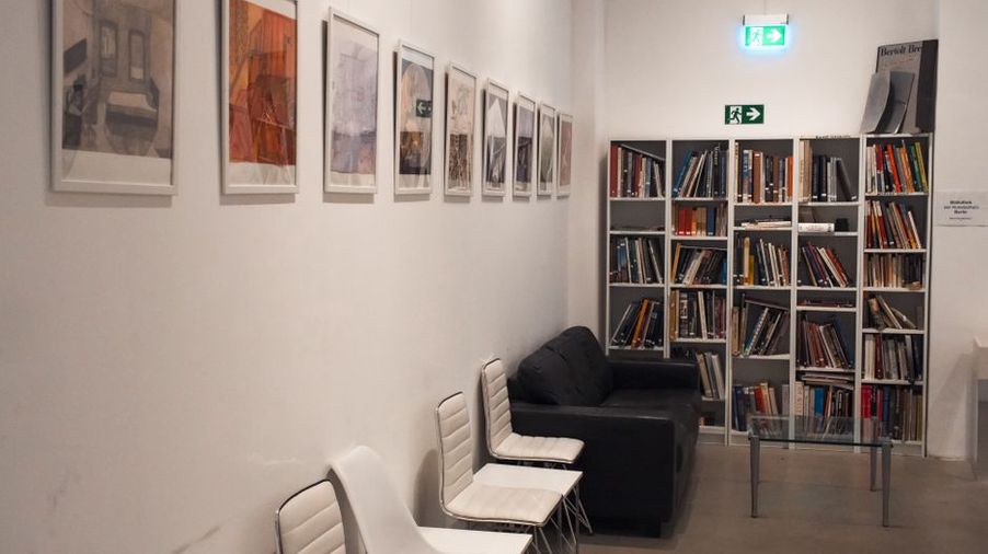 Open floor space in a quiet gallery room