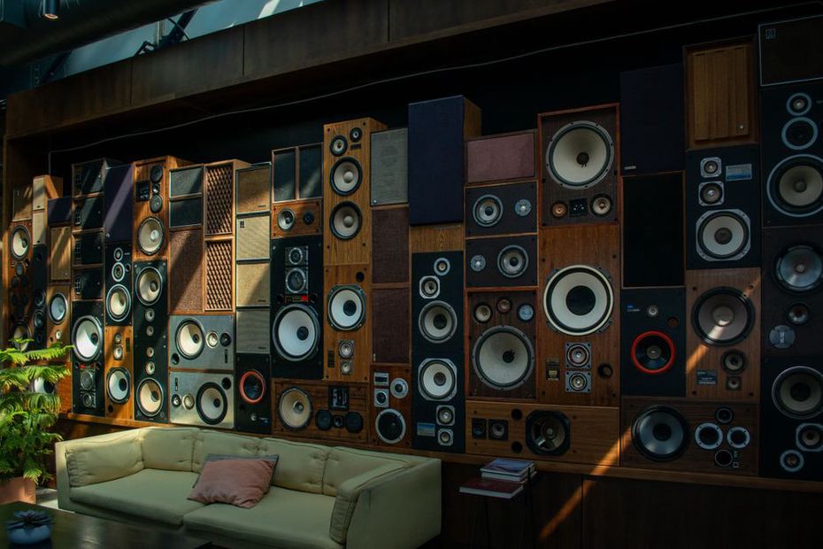 Speakers arranged around a quiet exhibition room