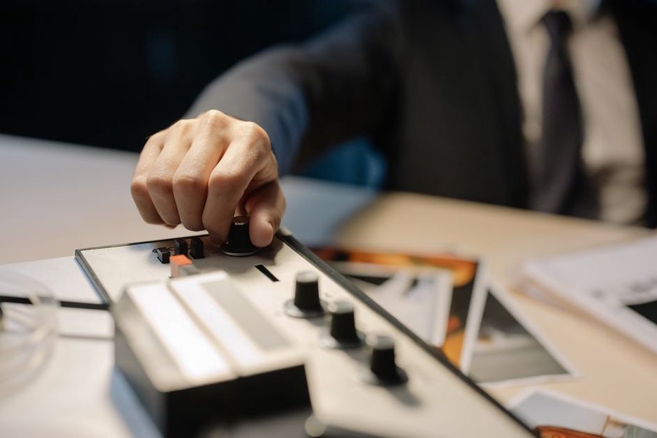 Synthesizer and recorder beside handwritten music notes
